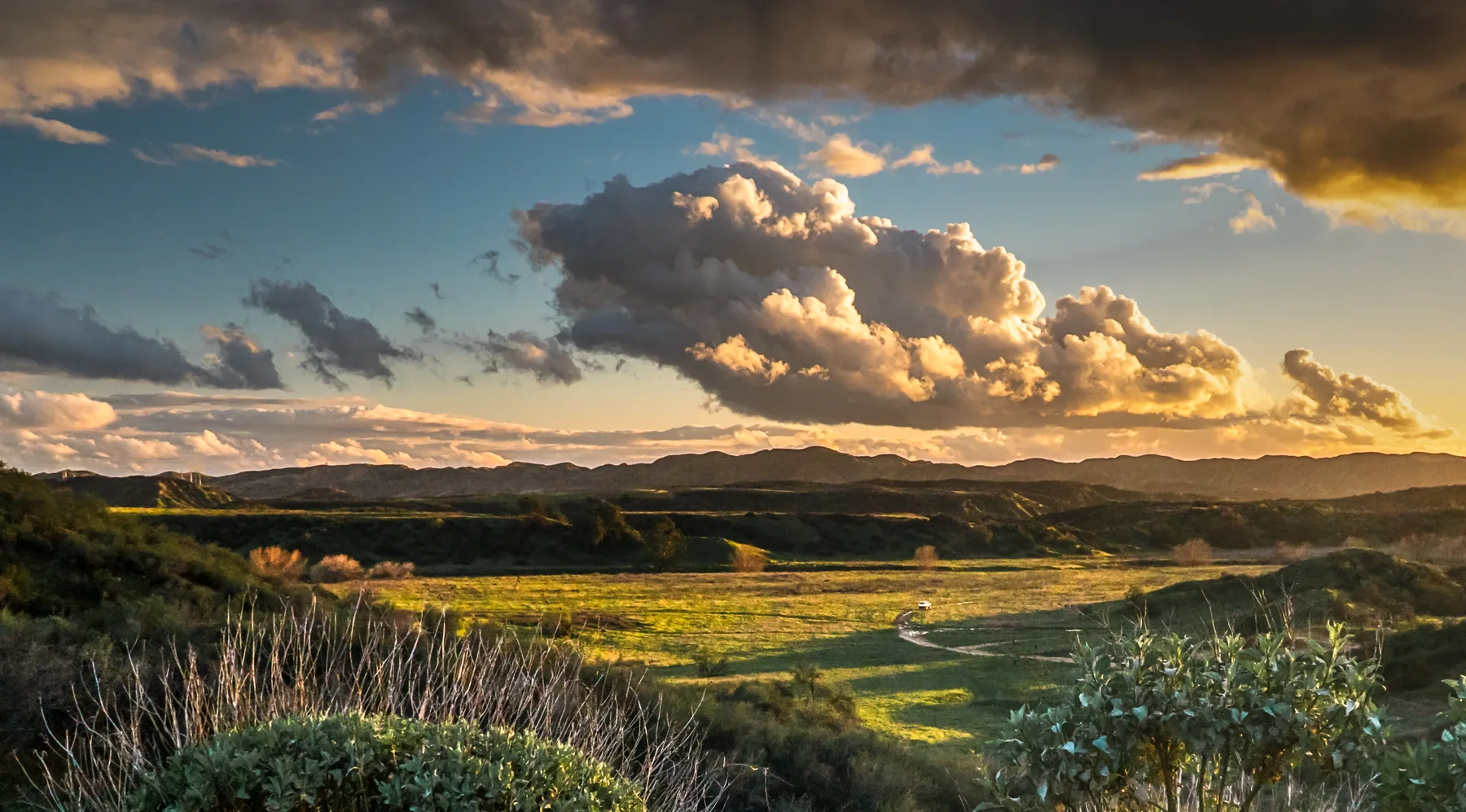 Yucaipa foothills landscape with golden light across rolling hills
